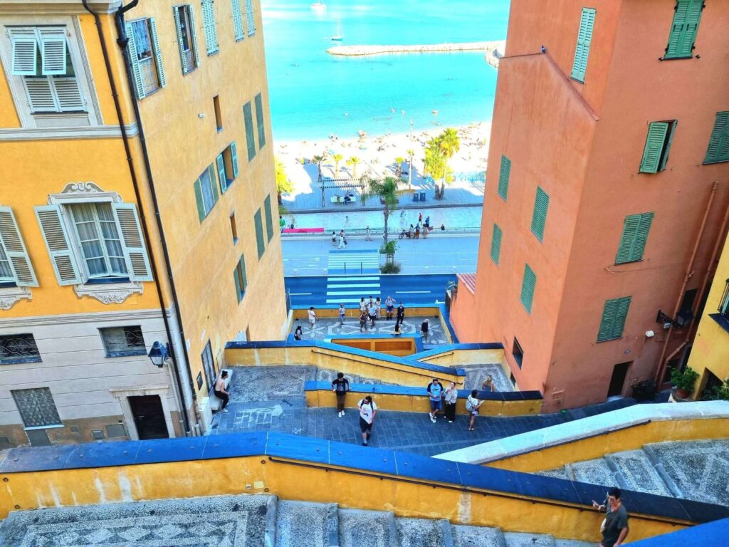 For this travel guide to the French Riviera, don't skip the Basilica stairs at Menton.